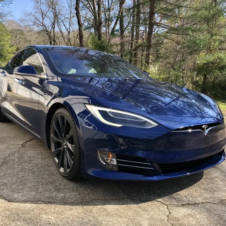 Tesla  LLC